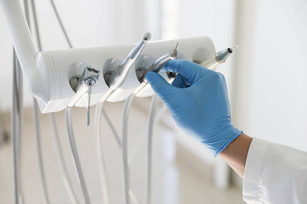 Professional Tooth Extraction technician working in Rochester, MN